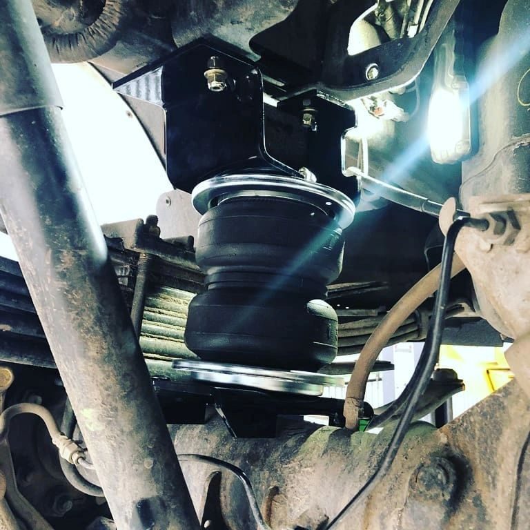 Suspension work under a truck